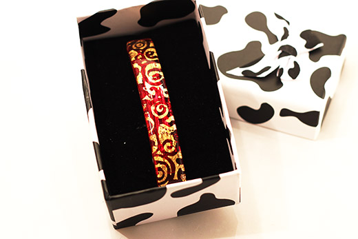 Barrette Rouge Spirales Or